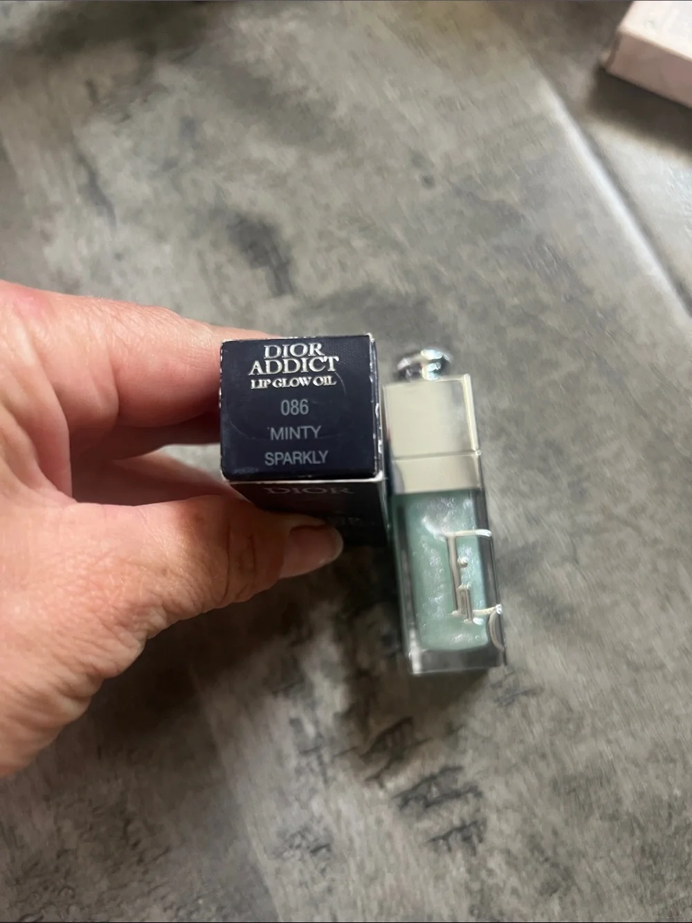 Dior Addict Lip Glow Oil in Mint Green with Silver Cap